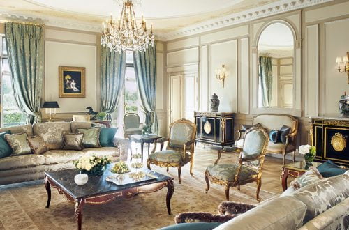 The "A" List, Gentle Leisure Activities to Slow Down Time 4 luxury living room with glamorous sofa cozy black cabinet luxuious chandelier lamps and gorgeous blue curtain The "A" List, Gentle Leisure Activities to Slow Down Time EAT LOVE SAVOR International luxury lifestyle magazine and bookazines